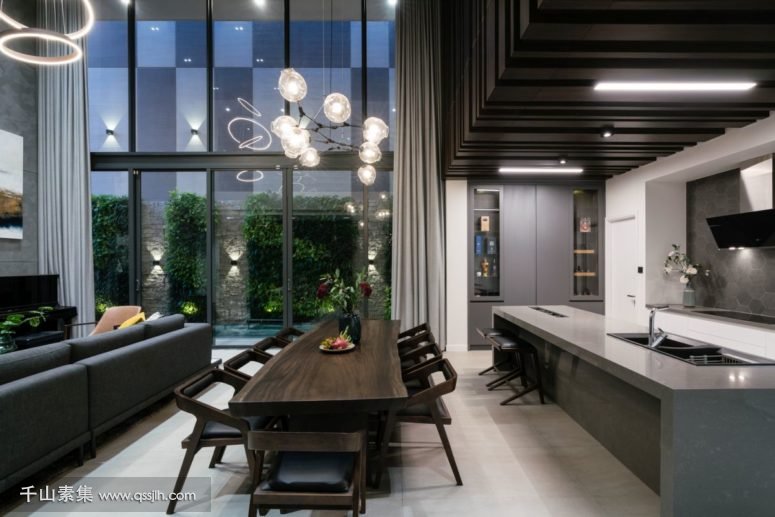 03-The-dining-area-is-next-to-the-minimalist-kitchen-775x517.jpg