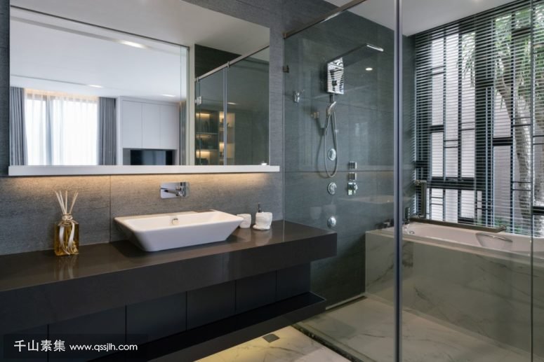 09-The-bathrooms-are-open-and-airy-done-in-modern-style-with-large-mirrors-775x517.jpg