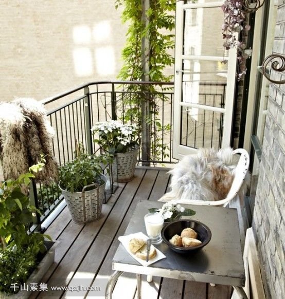 18-a-metal-table-a-couple-of-chairs-potted-greenery-are-all-you-need-for-a-simple-and-comfy-look.jpg