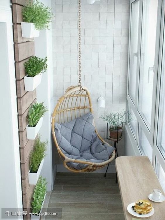 09-a-hanging-chair-wall-mounted-planters-a-folding-table-for-having-meals.jpg
